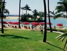 Beach Umbrellas and Chairs by Hilton Hawaiian Village Lagoon